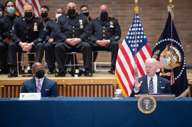 President Joe Biden, on the right, at Police Headquarters alongside Mayor Eric Adams, on the left. The two met to discuss ways to reverse the rise in gun violence.